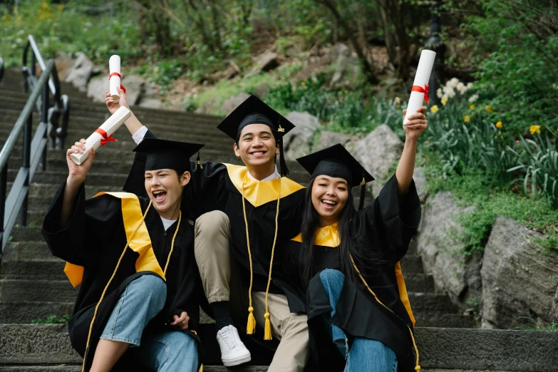 a group of people wearing graduation gowns and holding diplomas, pexels contest winner, asian descend, having a good time, avatar image, maintenance photo