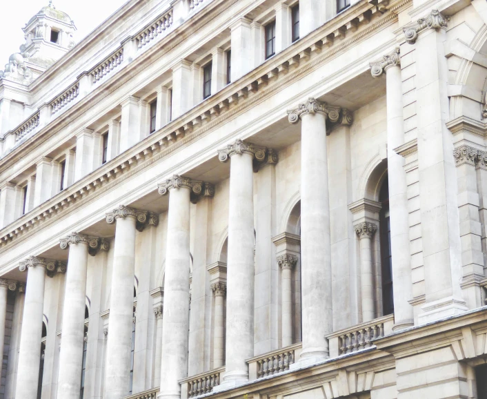 a large building with a clock on the front of it, an album cover, inspired by Christopher Wren, unsplash, pillars of marble, long street, profile image