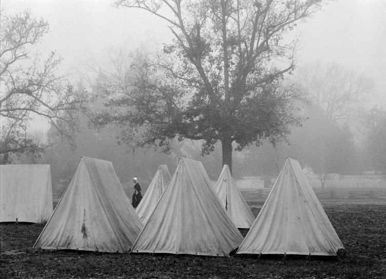 a black and white photo of tents in a field, by Gertrude Greene, fine art, fog of war, 1 6 x 1 6, boy scout troop, civil war style