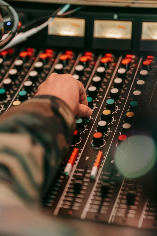 a person using a mixing board in a recording studio, an album cover, by Dan Content, pexels, private press, promo image, multiple stories, radio signals, chemistry