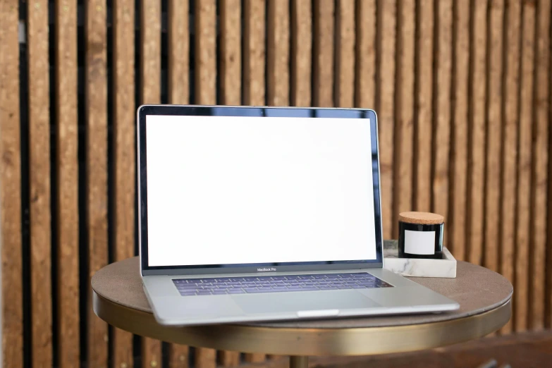 a laptop computer sitting on top of a table, a computer rendering, by Carey Morris, pexels, whitespace border, background image, no - text no - logo, instagram picture