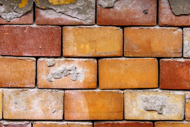 some different kind of brick wall with s and rust