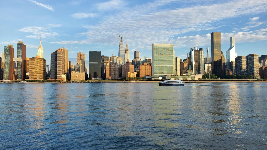 a large body of water with a city in the background, pexels contest winner, hudson river school, promo image, brooklyn background, high resolution image, multiple stories