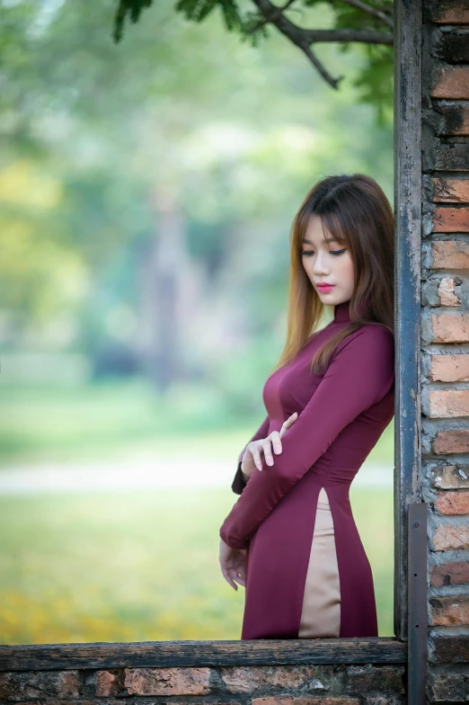 a woman in a maroon dress looking out of a window, inspired by Tan Ting-pho, pexels contest winner, realism, at a park, model with attractive body, vietnamese woman, 5 0 0 px models