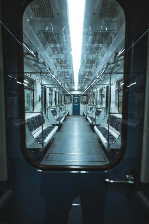 a view of the inside of a subway car, unsplash contest winner, hypermodernism, russia in 2 0 2 1, square, low quality photo, an empty backroom at night