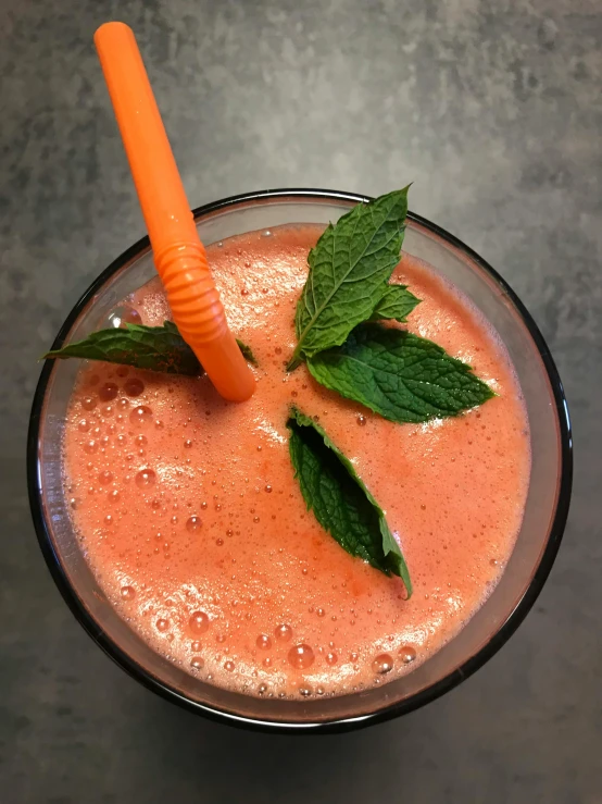 a close up of a drink in a glass with a straw, 🎀 🧟 🍓 🧚, profile image, mint, from above