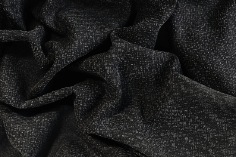 a close up image of a black fabric