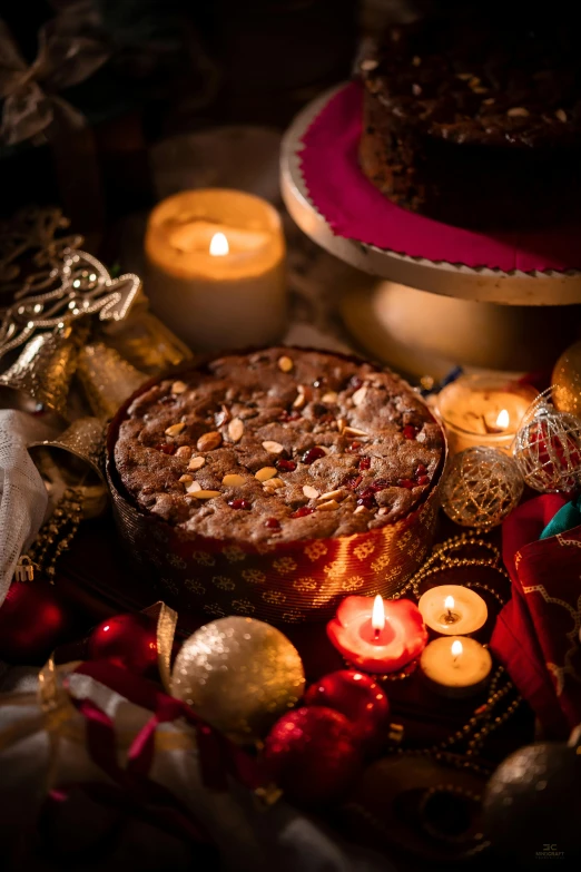 a cake sitting on top of a table next to candles, by Julia Pishtar, middle eastern, christmas night, product shot, rice