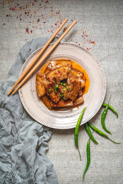 a close up of a plate of food with chopsticks, sichuan, square, 4l, contest winner 2021