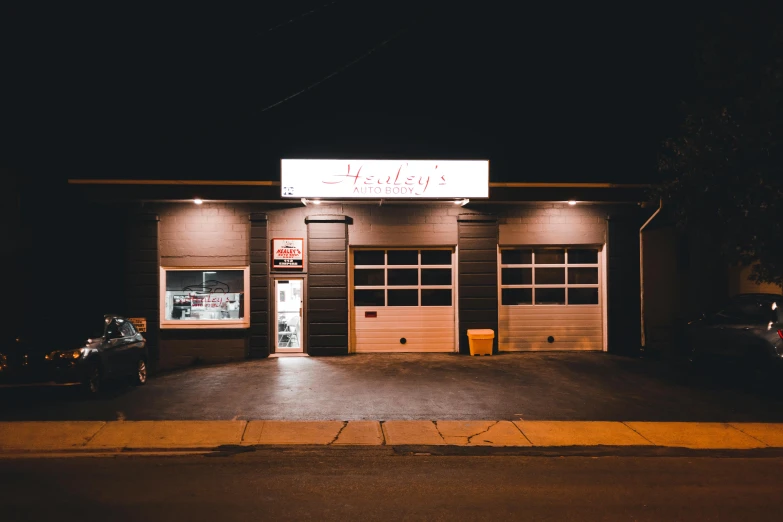 a car parked in front of a fire station at night, a photo, by Wesley Burt, pexels contest winner, dimly-lit cozy tavern, profile image, highley detailed, owsley