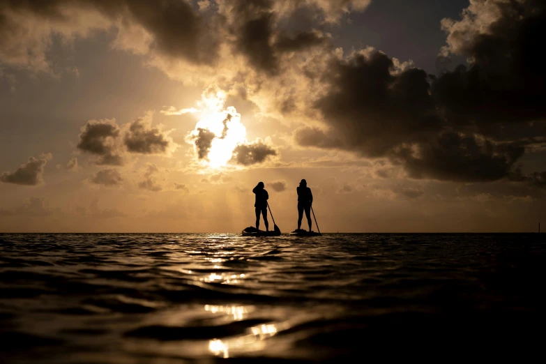 a couple of people riding on top of a surfboard, a picture, unsplash contest winner, romanticism, backlight, sup, profile image, thumbnail