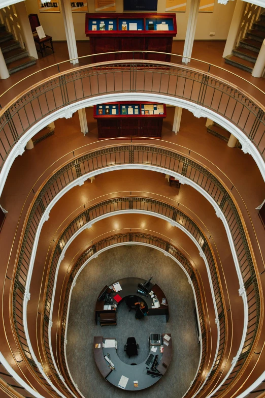 the top view of an empty building with a spiral staircase