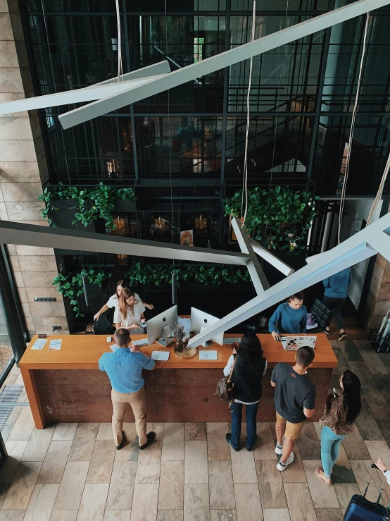 two people are looking at a sculpture in a building