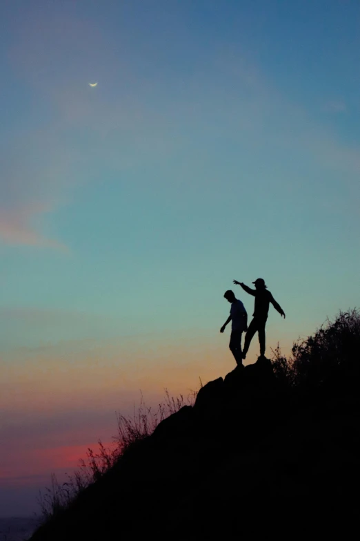 a couple of people standing on top of a hill, pexels contest winner, romanticism, reaching for the sky, late summer evening, minn, single figure