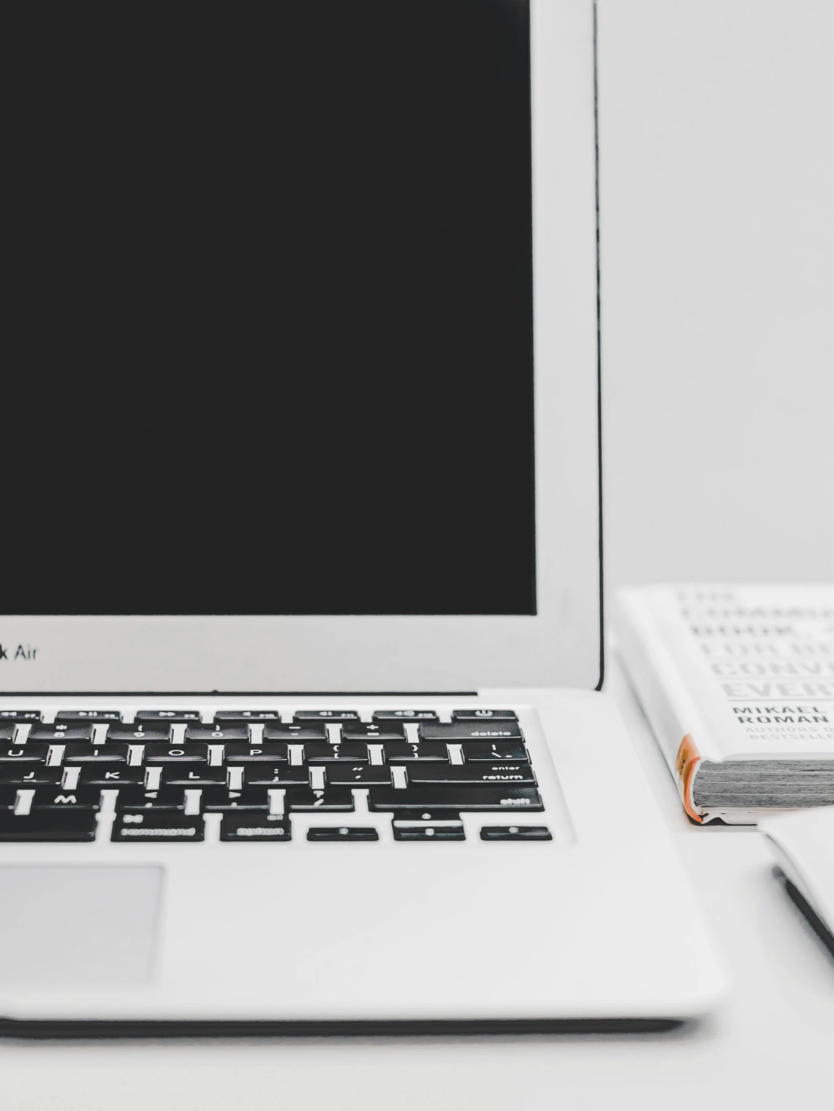 a laptop computer sitting on top of a white desk, by Carey Morris, trending on unsplash, informative texts, white and grey, thumbnail, multiple stories