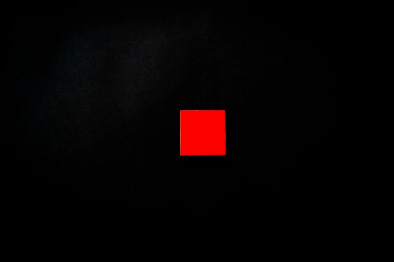 a square with some sort of red on it