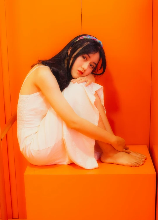 a woman in a white dress sitting on an orange bench, an album cover, inspired by Ma Yuanyu, unsplash, curtain bangs, profile image, aesthetic!!!!!! female genie, chiho ashima