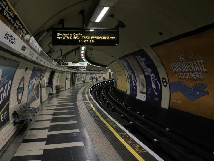 a subway station with a train on the tracks, an album cover, inspired by Thomas Struth, in london, round-cropped, fan favorite, octa 8k