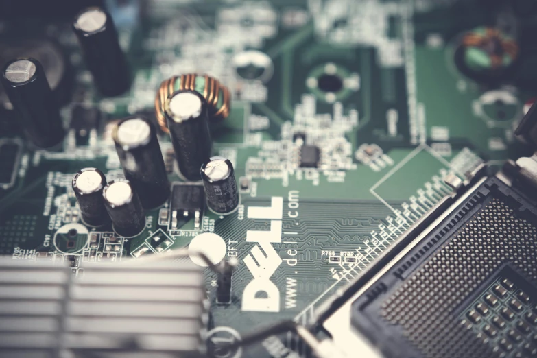 a close up of a computer mother board, by Jason Felix, pexels, instagram post, a green, historical, dsrl photo
