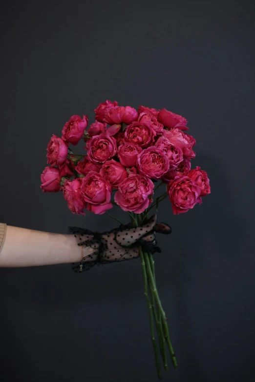 flowers being held in a glass vase