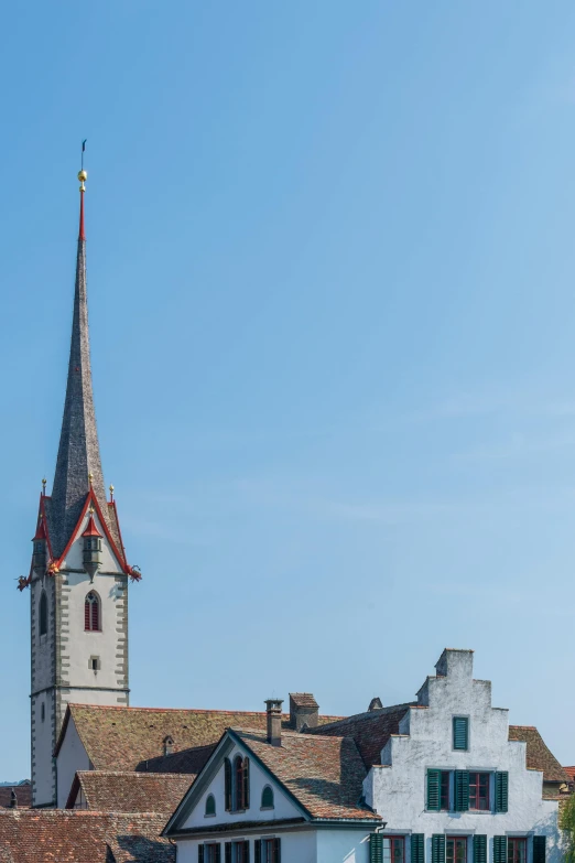 a large building with a steeple on top of it, by Jan Tengnagel, photo of zurich, clear sky above, 2 5 6 x 2 5 6, 15081959 21121991 01012000 4k