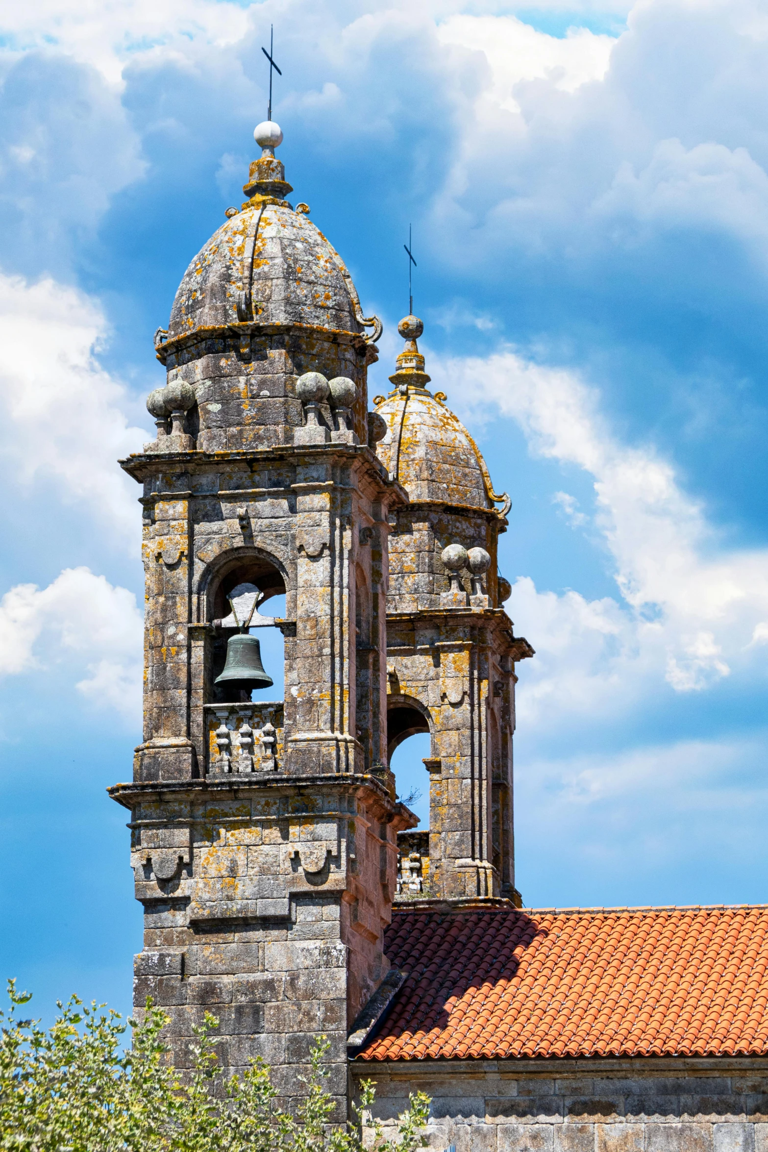 a tall tower with a clock on top of it, pexels contest winner, baroque, orange roof, bispo do rosario, bells, profile image