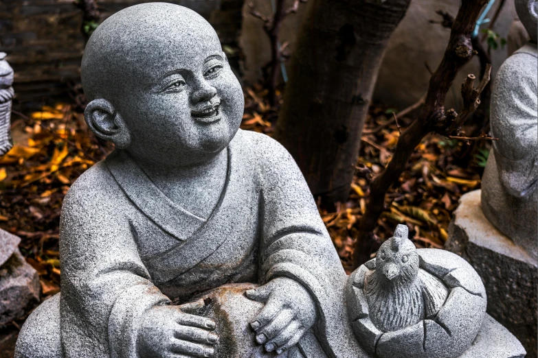 a close up of a statue of a person with a cat, a statue, inspired by Tani Bunchō, pexels contest winner, sitting relax and happy, fisting monk, little kid, grey