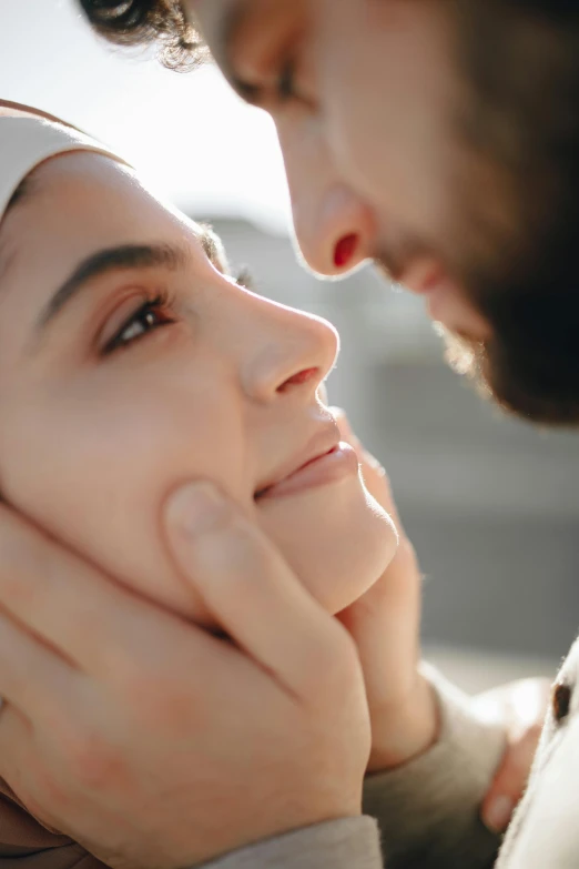 a man and a woman looking into each other's eyes, by Julia Pishtar, trending on pexels, renaissance, square facial structure, skincare, woman holding another woman, high angle close up shot