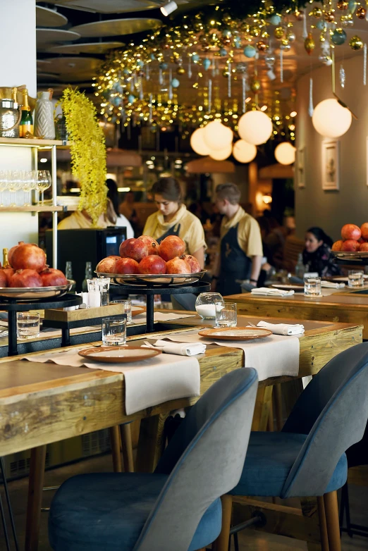 a dining room filled with lots of tables and chairs, by Anita Malfatti, unsplash, renaissance, plates of fruit, chefs table, during autumn, square