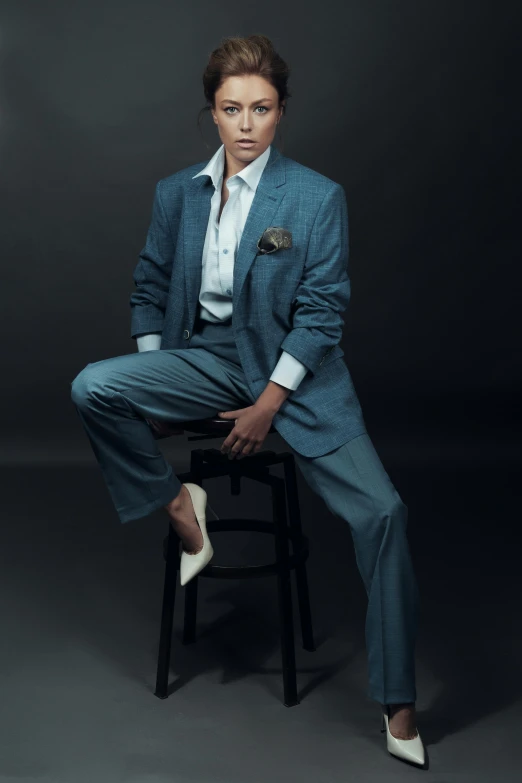 a woman in a blue suit sitting on a stool, by Natasha Tan, androgynous male, 15081959 21121991 01012000 4k, grey suit, asian male