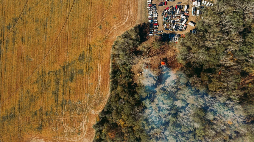 an aerial view of a small town in the middle of a field, auto-destructive art, woods on fire, thumbnail, festivals, portrait image