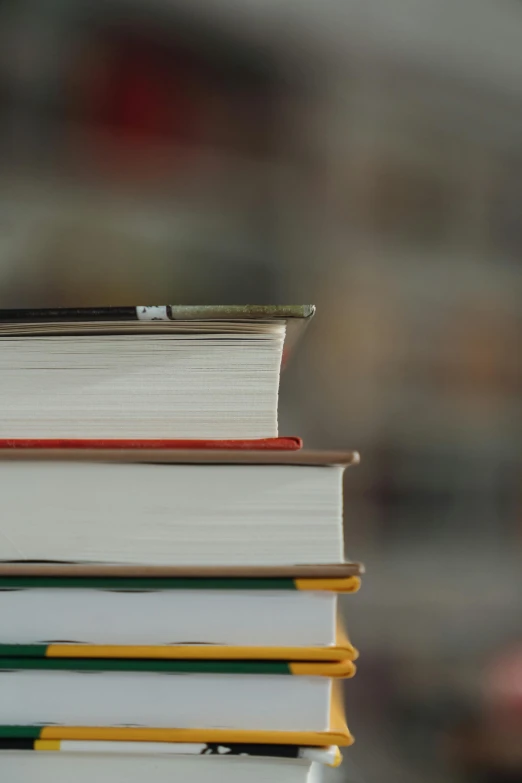 a stack of books sitting on top of each other, pexels, academic art, background image, zoomed in shots, cinematic still, upclose