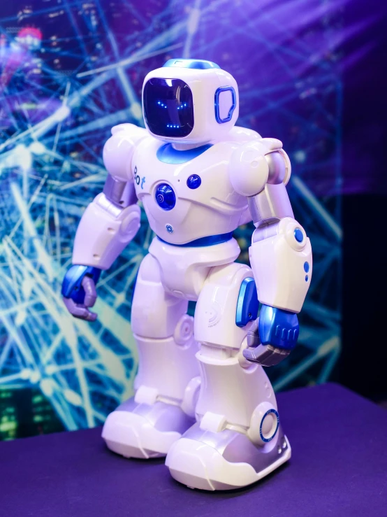 a close up of a toy robot on a table, siggraph, full-body, taken in 2022, ((robot))