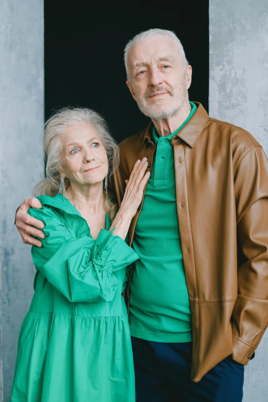 an elderly couple posing for a portrait