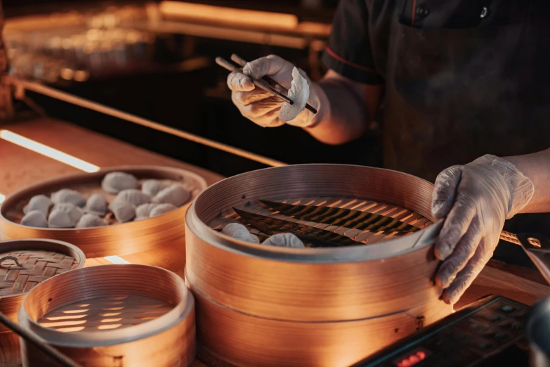 a man preparing dim dim dim dim dim dim dim dim dim dim dim dim dim dim dim dim dim dim dim dim dim dim dim dim dim, a digital rendering, trending on pexels, dumplings on a plate, award winning cinematic still, golden hour in beijing, australian