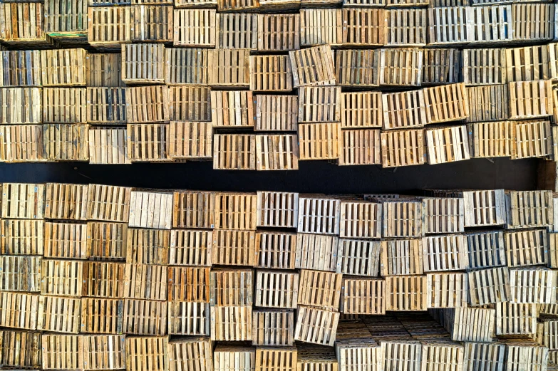 a pile of wooden planks stacked on top of each other, by Matt Cavotta, auto-destructive art, full pallet image, bird's eye, wooden crates, lattice