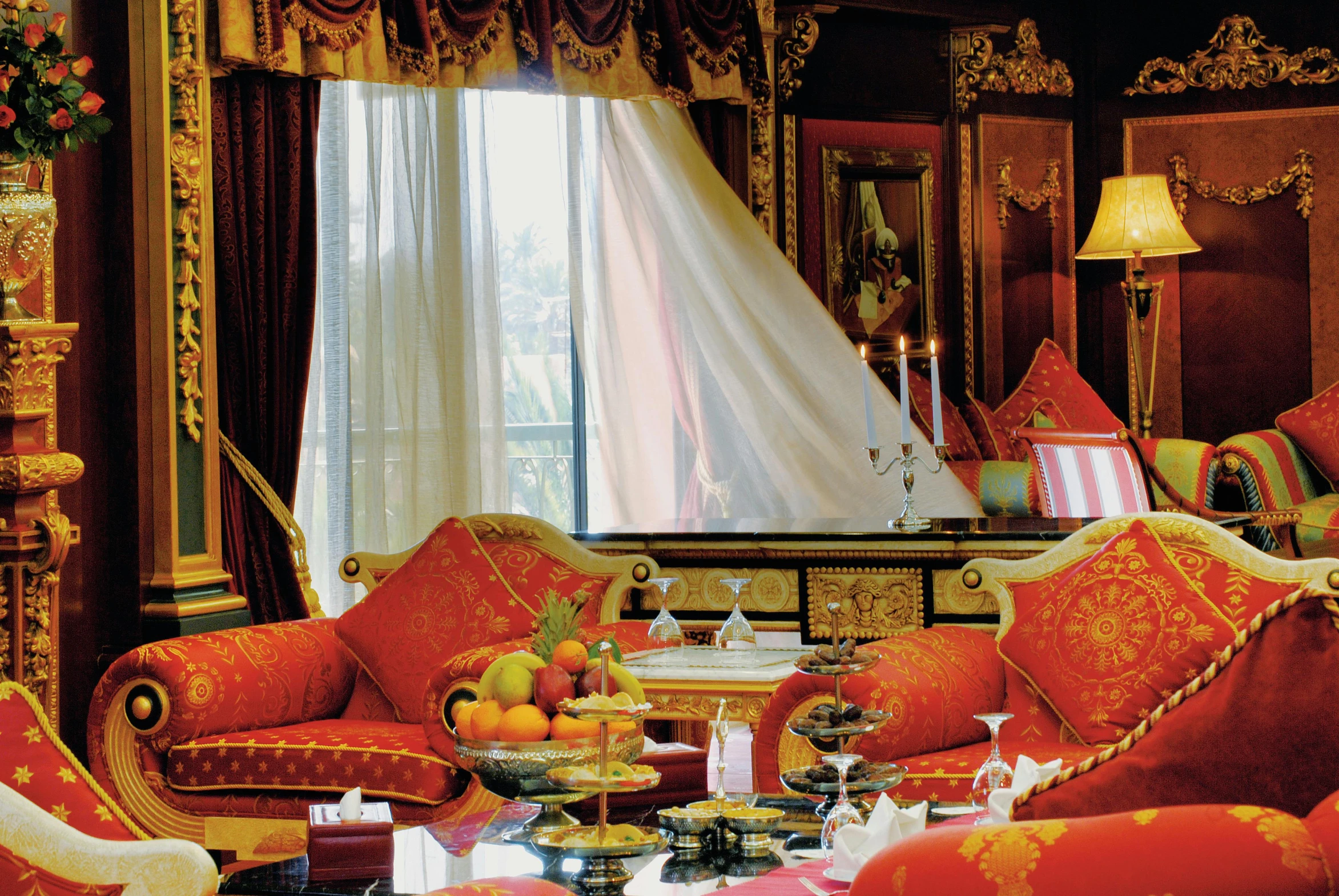 a fancy living room is shown in red