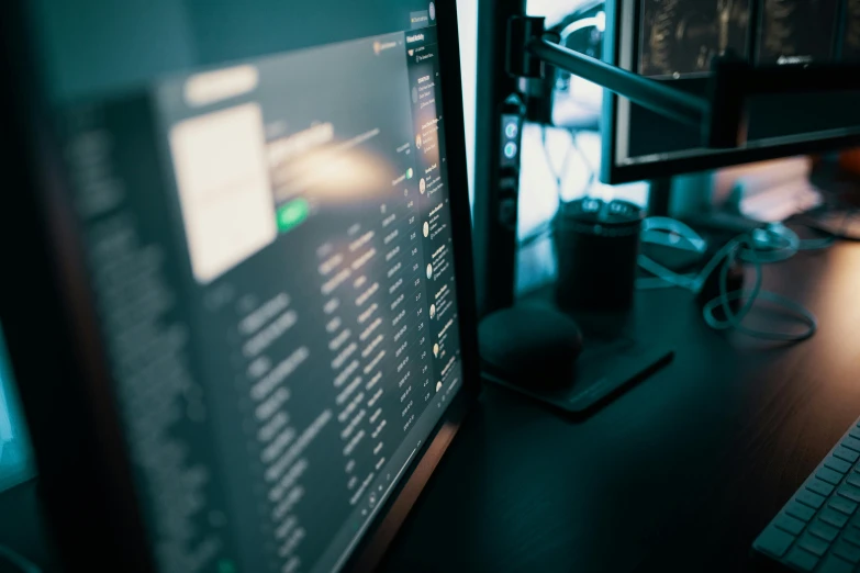 a desktop computer sitting on top of a wooden desk, unsplash, hacking into the mainframe, close up to the screen, low quality photo, thumbnail