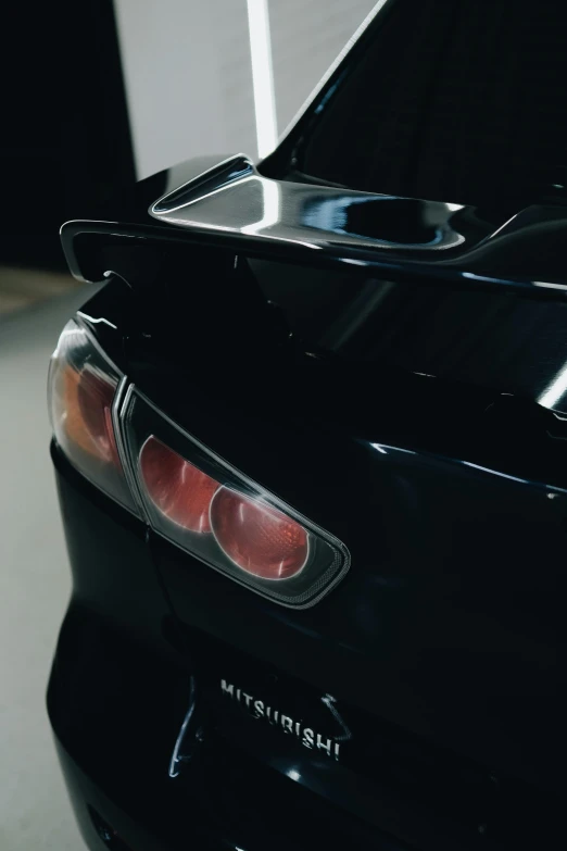 the front end of a sports car is black