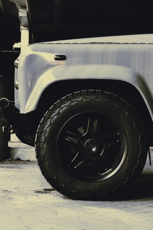 close up on the front wheel rim of a pickup truck