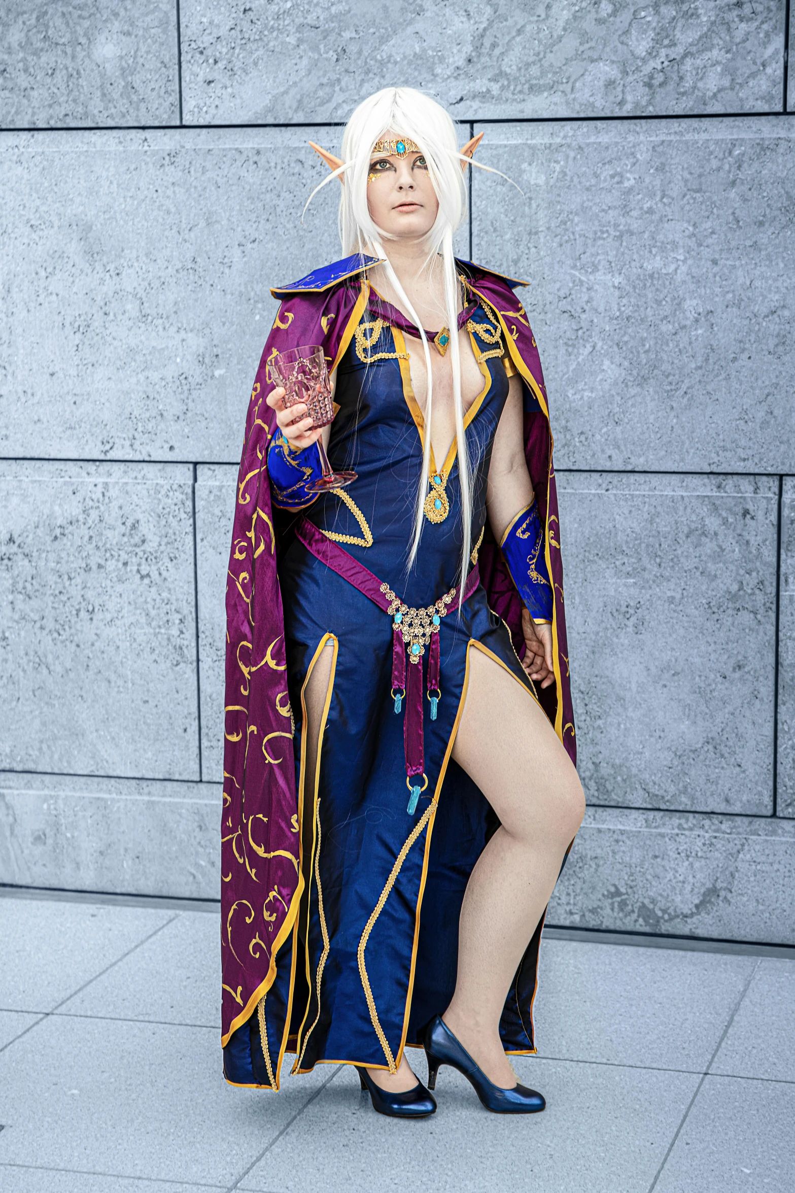 a woman in a cosplay outfit posing for a picture, inspired by INO, unsplash, renaissance, old male archmage, zenra taliyah, taken with sony alpha 9, square