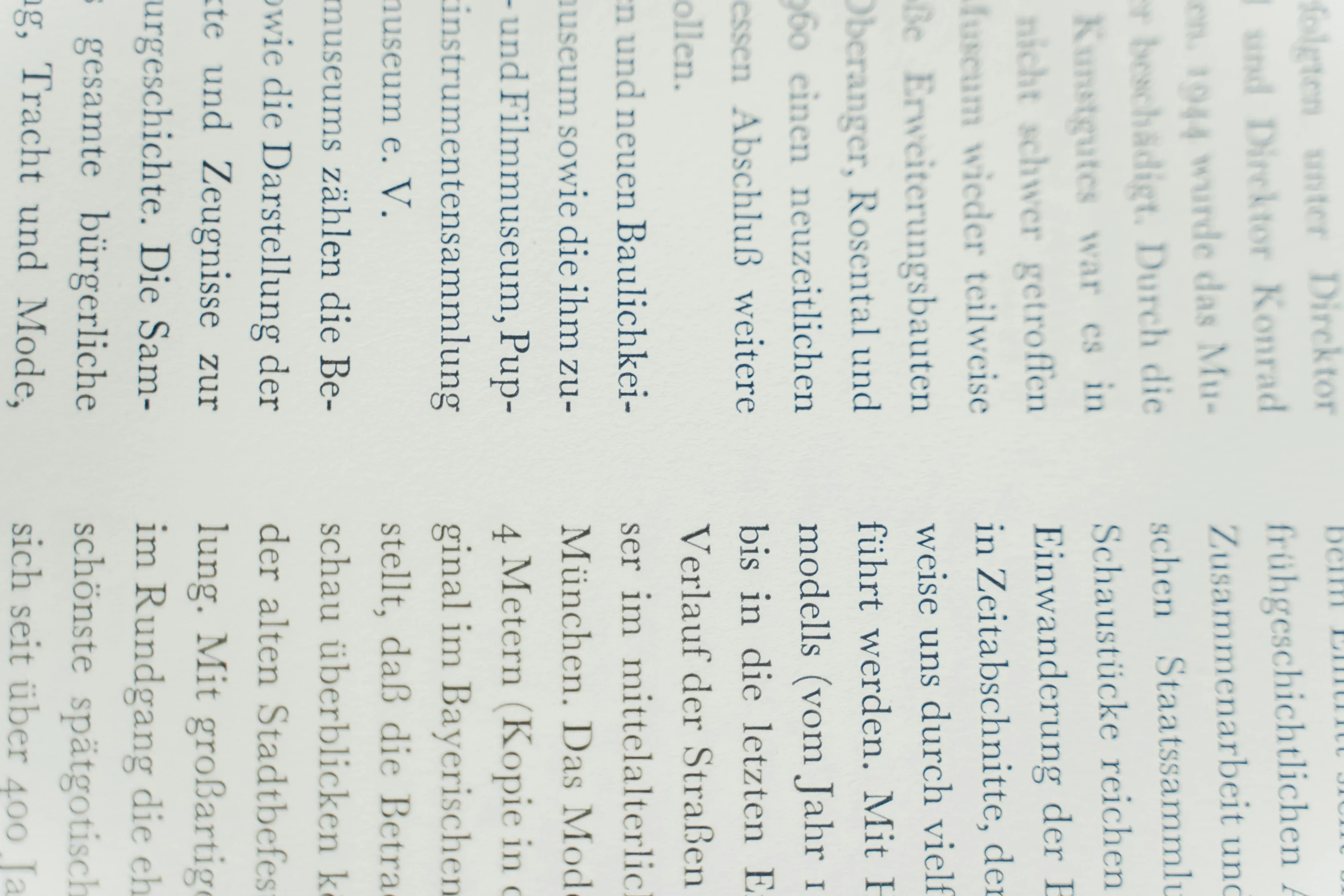 a close up of an open book on a table, by Carey Morris, international typographic style, full page scan, blue, english text, semi-transparent