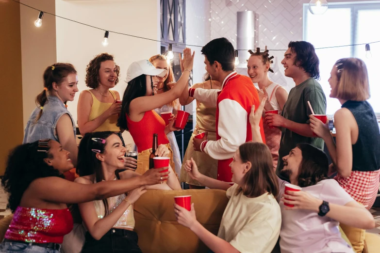 a group of people sitting on top of a couch, trending on pexels, awkwardly holding red solo cup, serving fries, college party, profile image