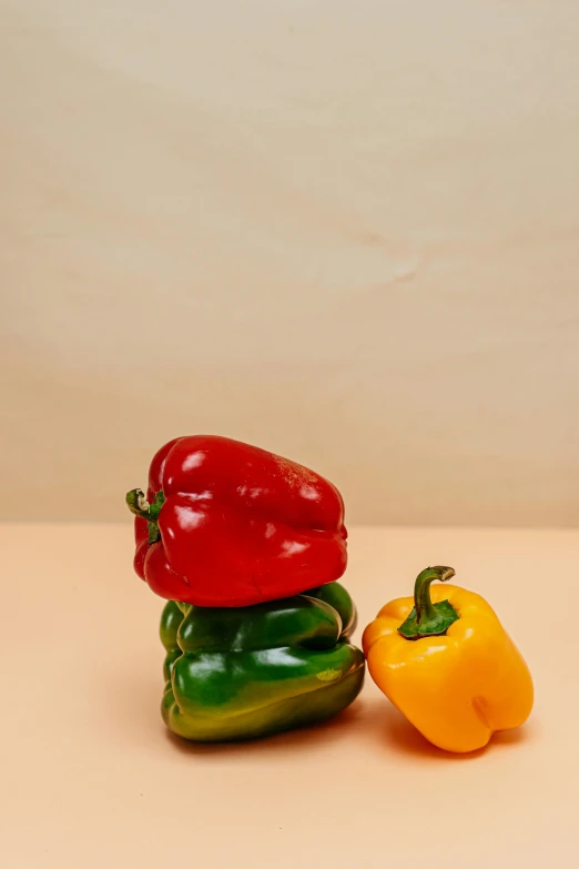 three peppers sitting next to each other on a table, inspired by Fernando Botero, unsplash, 4 k product photo, medium height, natural soft light, 6 pack