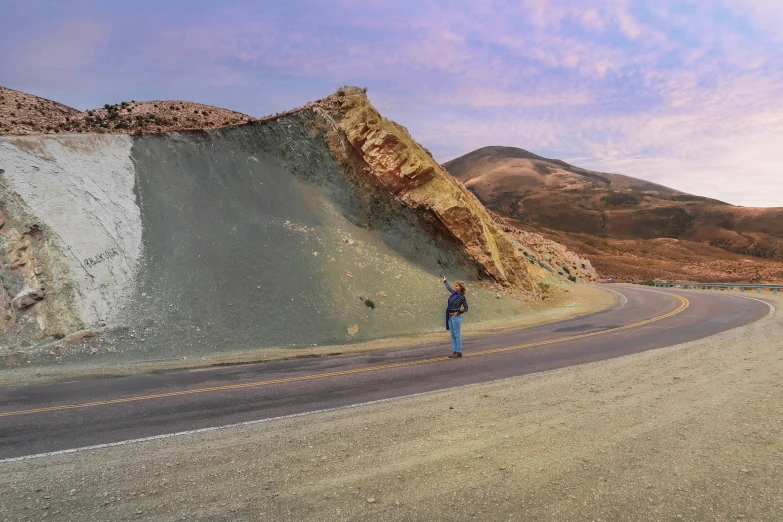 the man standing in the middle of the road