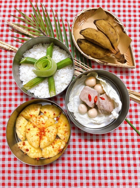 a table topped with bowls of food on top of a red and white checkered table cloth, inspired by Nam Gye-u, palm, 千 葉 雄 大, 5k, grey