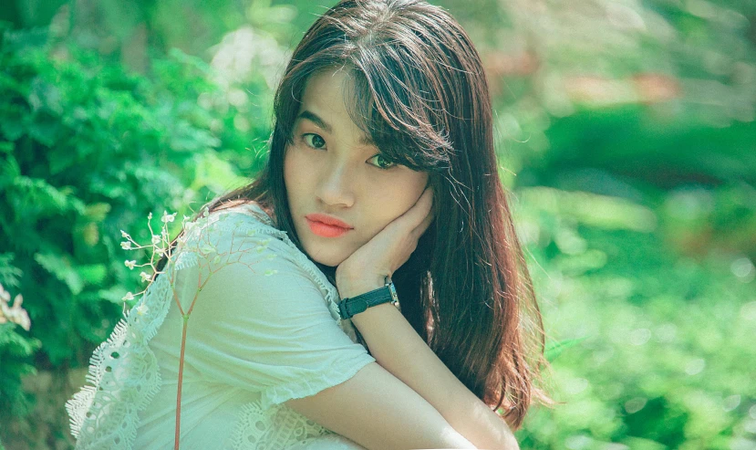 a woman sitting on top of a wooden bench, inspired by Kim Jeong-hui, unsplash, realism, light green tone beautiful face, bae suzy, dang my linh, innocent look