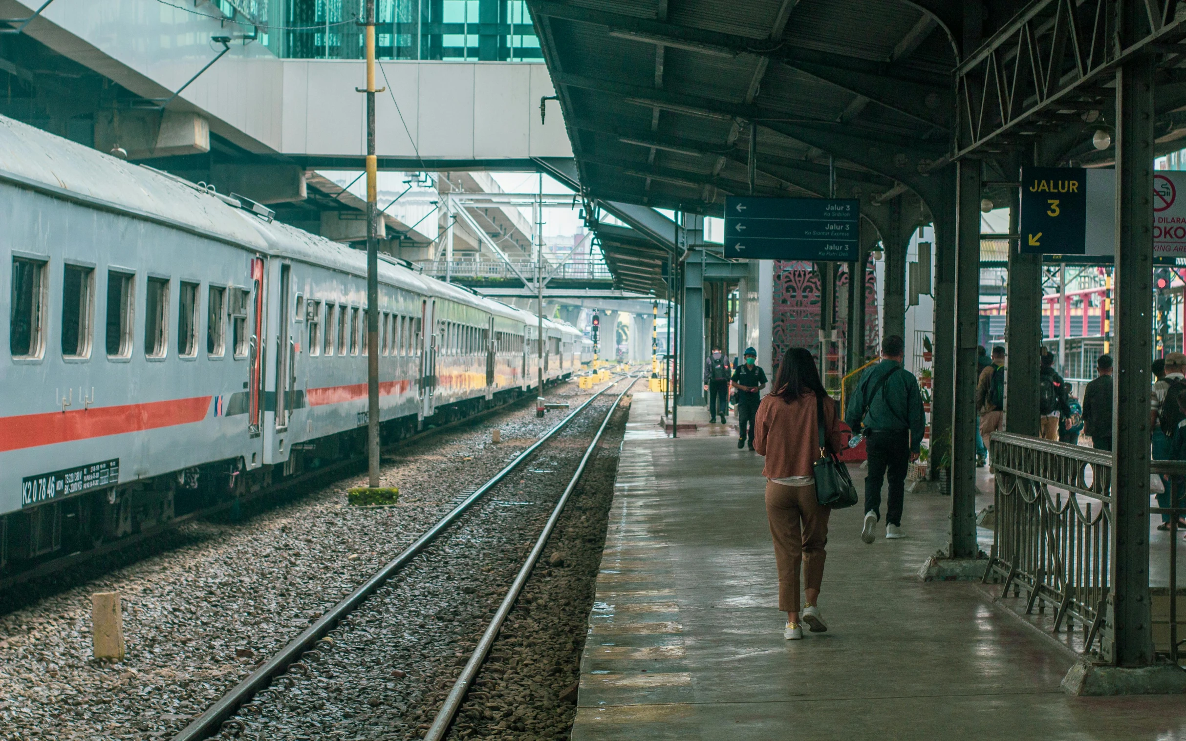 a group of people standing on a platform next to a train, pexels contest winner, hyperrealism, jakarta, train station in summer, square, high quality photo