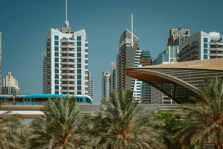 a train traveling through a city next to tall buildings, by Lubin Baugin, pexels contest winner, gta : dubai, sustainable architecture, palms and miami buildings, three - quarter view