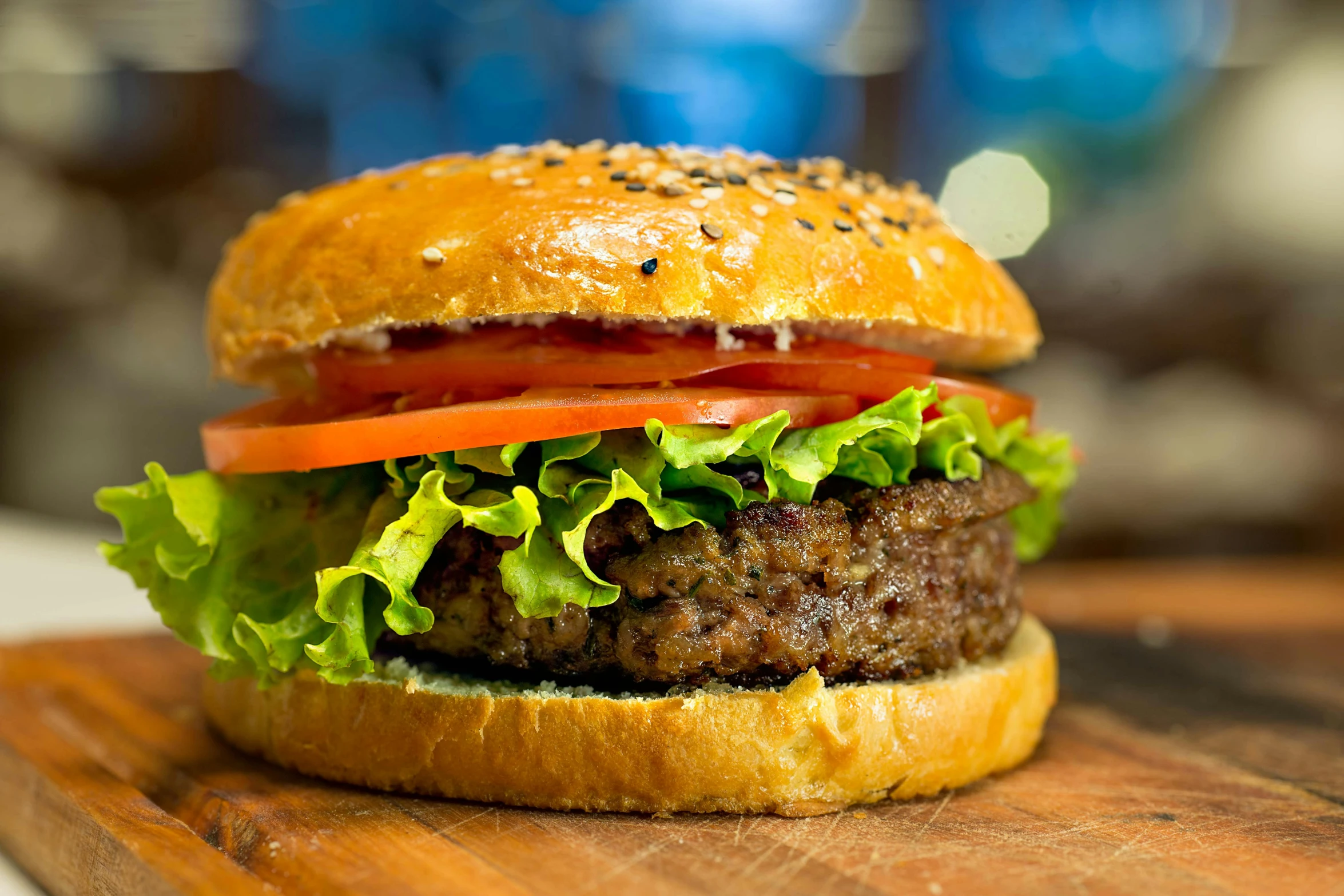 a hamburger sitting on top of a wooden cutting board, a portrait, by Julia Pishtar, pexels, pbr, mediterranean, greens), thumbnail